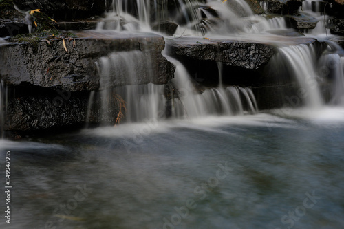 Man-made cascade over a small waterfall