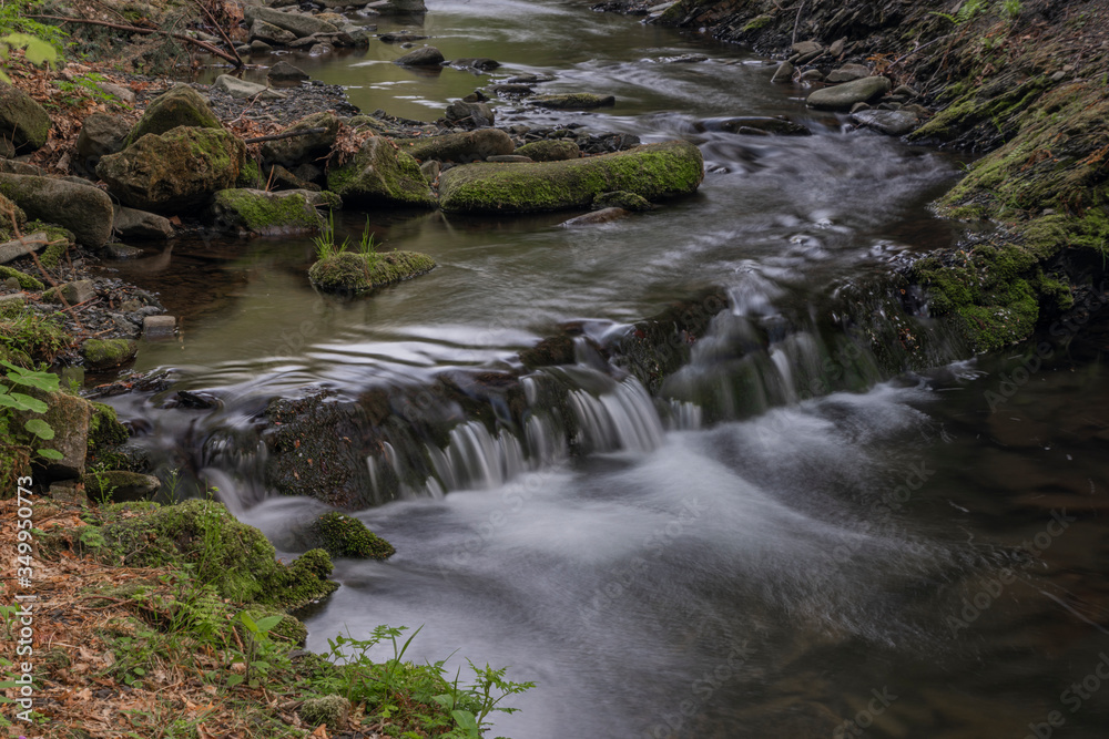 Lomna river in Trojanovice village in spring hot day