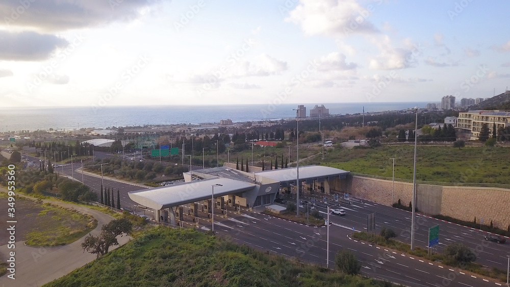 HAIFA, ISRAEL - April 10, 2020: Aerial view of a toll payment point. Haifa Toll road collection stop.