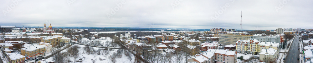 Panorama of the Kirov city and and Razderikhinsky ravine in the central part of the city of Kirov on a winter day from above. Russia from the drone