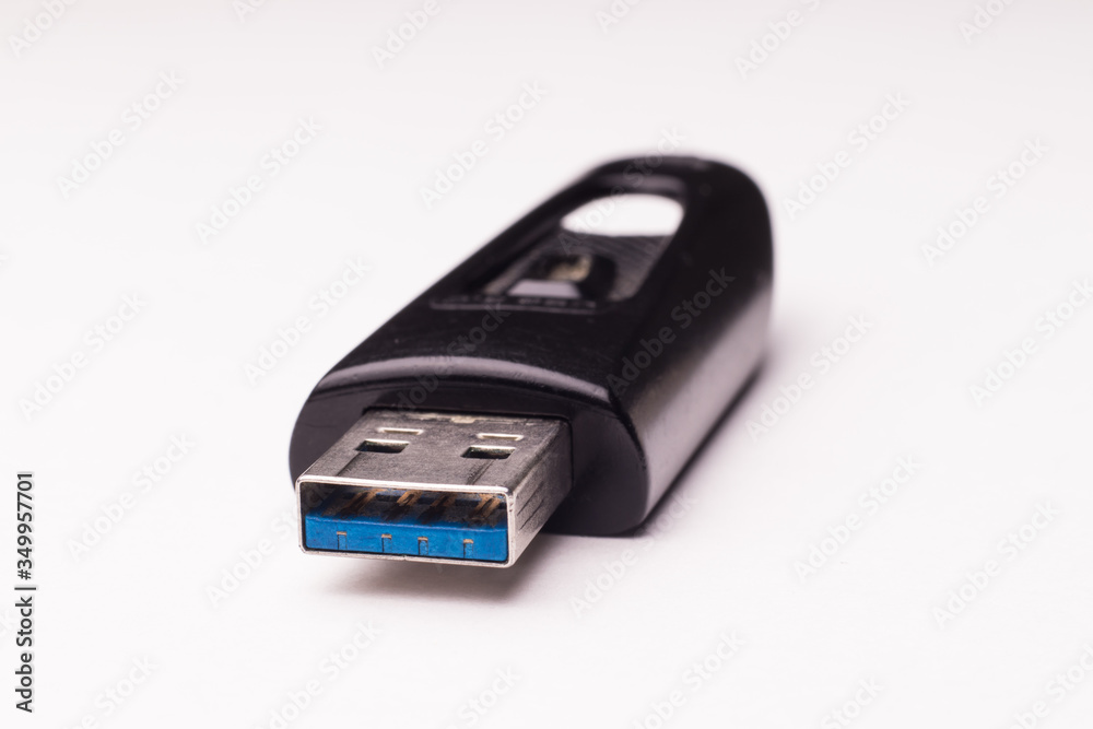 Black usb flash memory stick, selective focus Black usb flash memory stick, selective focus
