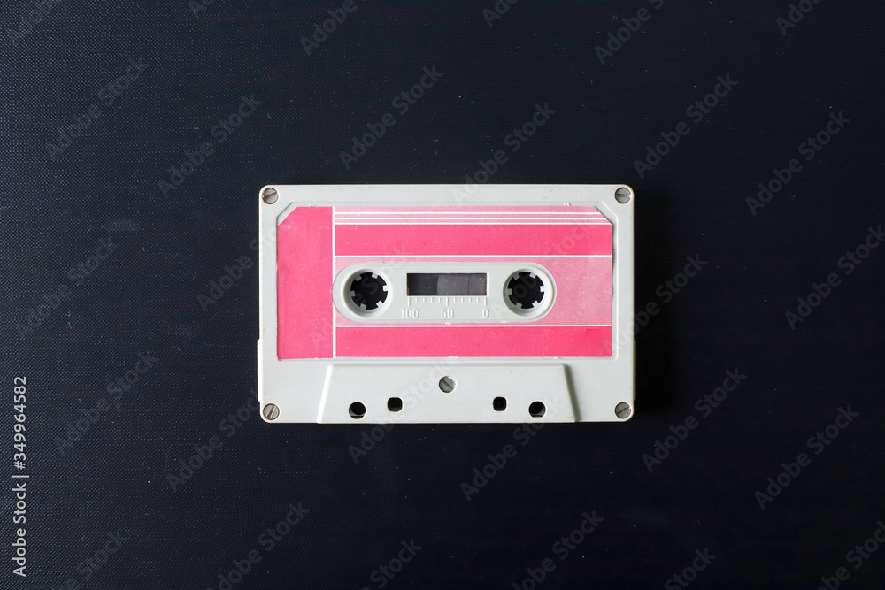 Obraz premium Old tape cassette, old or aged wood background. İsolated casette