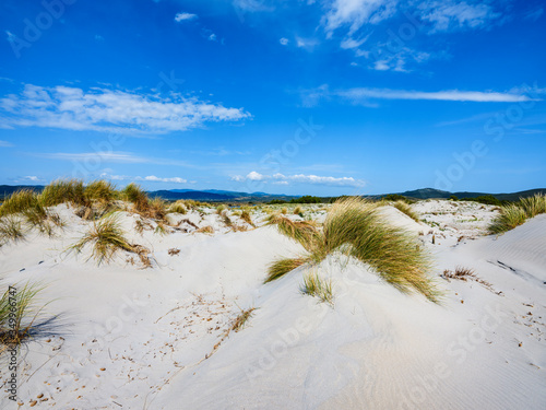 The white sand of Is Arenas Biancas beach, with tall, white dunes called Le Dune, Sant'Anna Arresi, Sardinia, Italy
