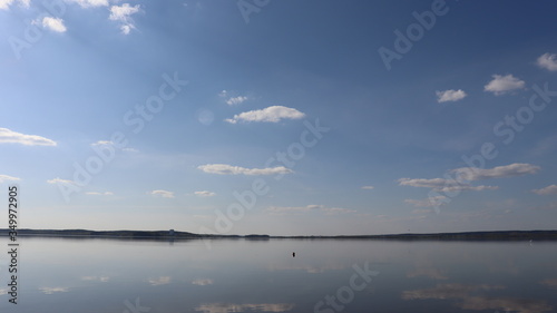 sky reflection in lake water