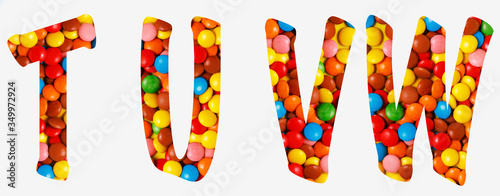candy alphabet font t,u,v,w, made of real colored candy cut letter shape. Collection of brilliant candy font for your unique decoration with concept ideas