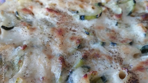 
4K video, Close up view of Zucchini noodle gratin with bechamel sauce