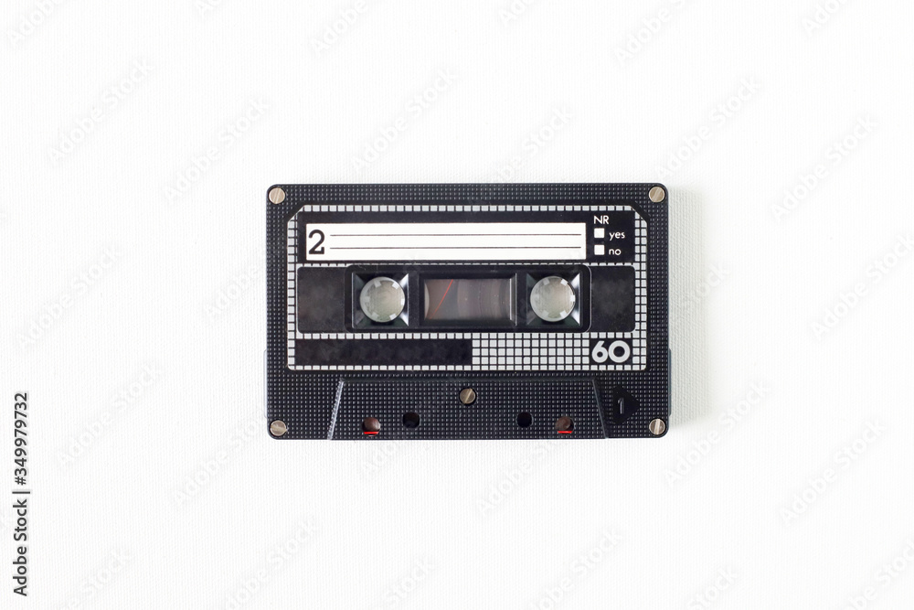 Obraz premium Old tape cassette, old or aged wood background. İsolated casette