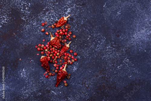 Red hot dried chili pepper on blue background