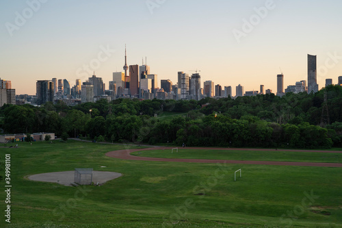 Toronto City Skyline at sunset from Riverdale Park East in Ontario Canada