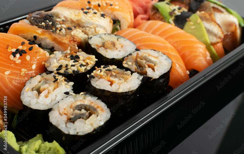 Plastic Container with Sushi Set Ready for Takeout Delivery Plastic Container with Sushi Set Ready for Takeout Delivery