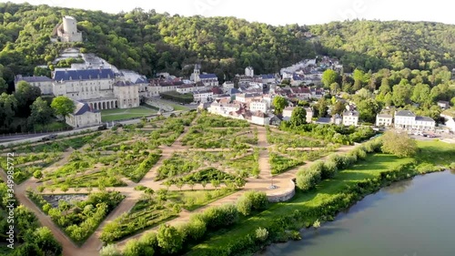 Scenic aerial view of La Roche-Guyon with its remarkable vegetable garden in the Val-d'Oise department in Île-de-France in northern France. One of the most beautiful villages of France photo