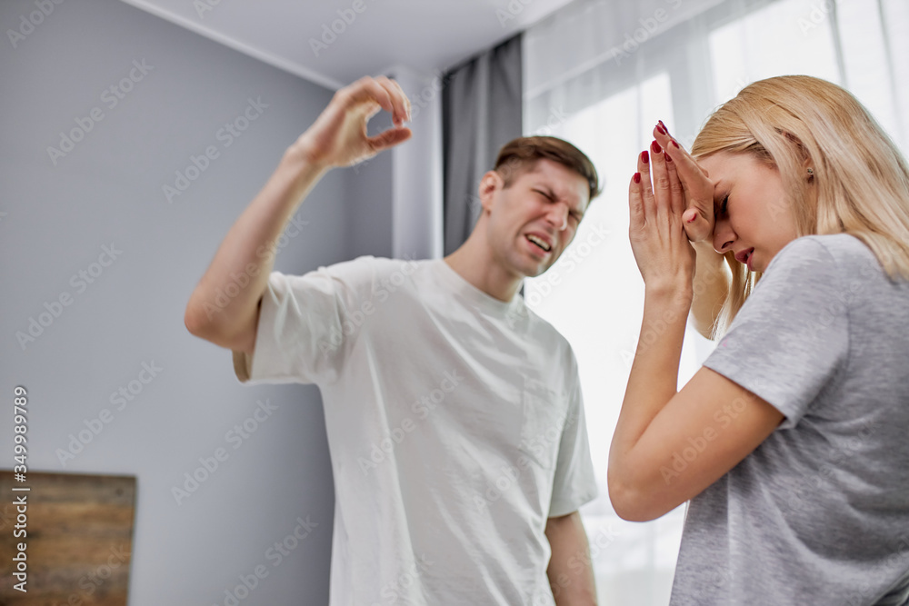 mentally-unbalanced-man-beats-his-wife-at-home-defenseless-woman-tries
