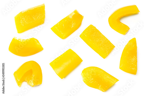 cut slices of yellow sweet bell pepper isolated on white background. top view