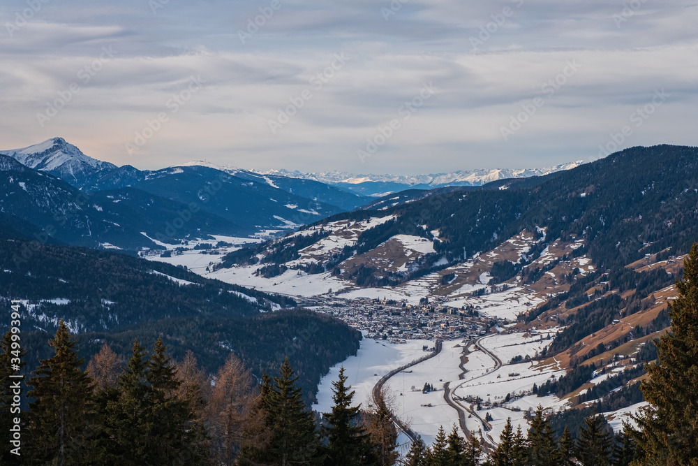 Winter landscape in Tre Cime Dolomiti, or Drei Zinnen Dolomites. Monte Elmo Sesto , Italy. January 2020. Top view on San Candido.