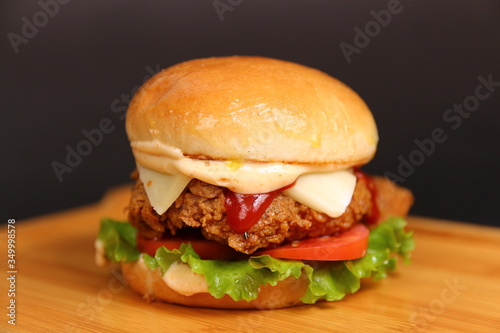 Fried Zinger Chicken Burger Sandwich with Cheese photo