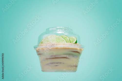 Cold cake with lemon flavored cookies in packaging