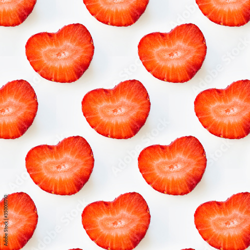 Photographic collage, seamless pattern with Isolated heart shape red strawberry cut in half on a white background. Macro square image about fresh organic berries, harvets, healthy food and vitamin C