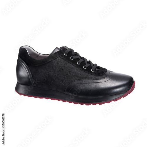 leather sneakers for men, black sports shoes, sports shoes, clothing accessories isolated on a white background.