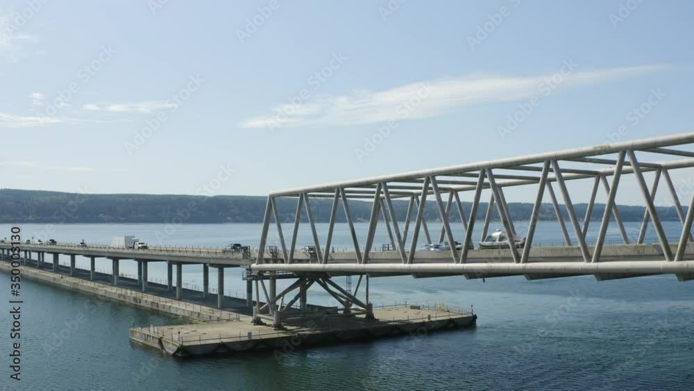 Traffic on Hood Canal Bridge Poulsbo Washington USA - Aerial Drone Birds Eye View Traffic on Hood Canal Bridge Poulsbo Washington USA - Aerial Drone Birds Eye View
