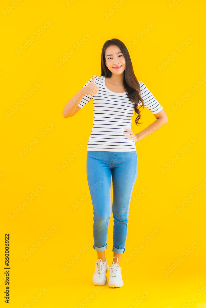 Portrait beautiful young asian woman smile happy with action Portrait beautiful young asian woman smile happy with action