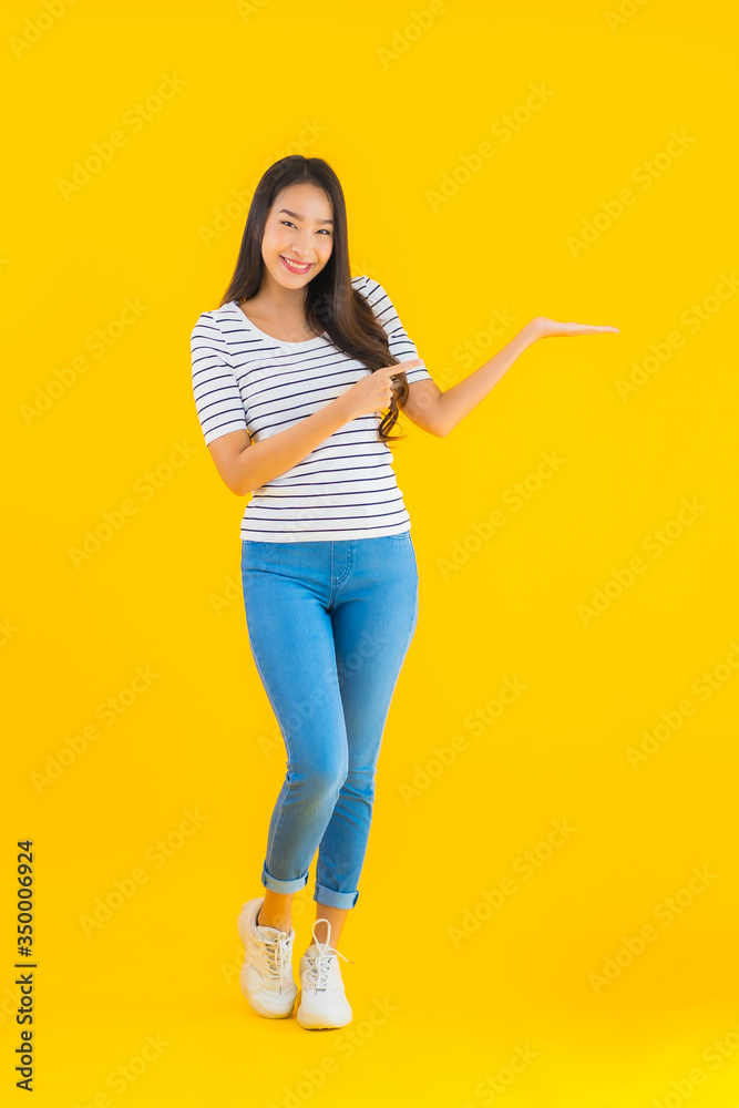 Portrait beautiful young asian woman smile happy with action Portrait beautiful young asian woman smile happy with action