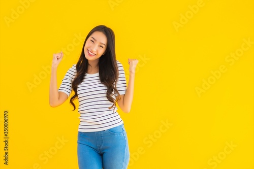 Portrait beautiful young asian woman smile happy with action