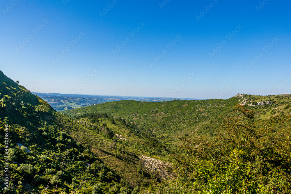 Scenic view of the mountain range of Aire and Candeeiros. Fórnea and Alvados area. Portugal Scenic view of the mountain range of Aire and Candeeiros. Fórnea and Alvados area. Portugal