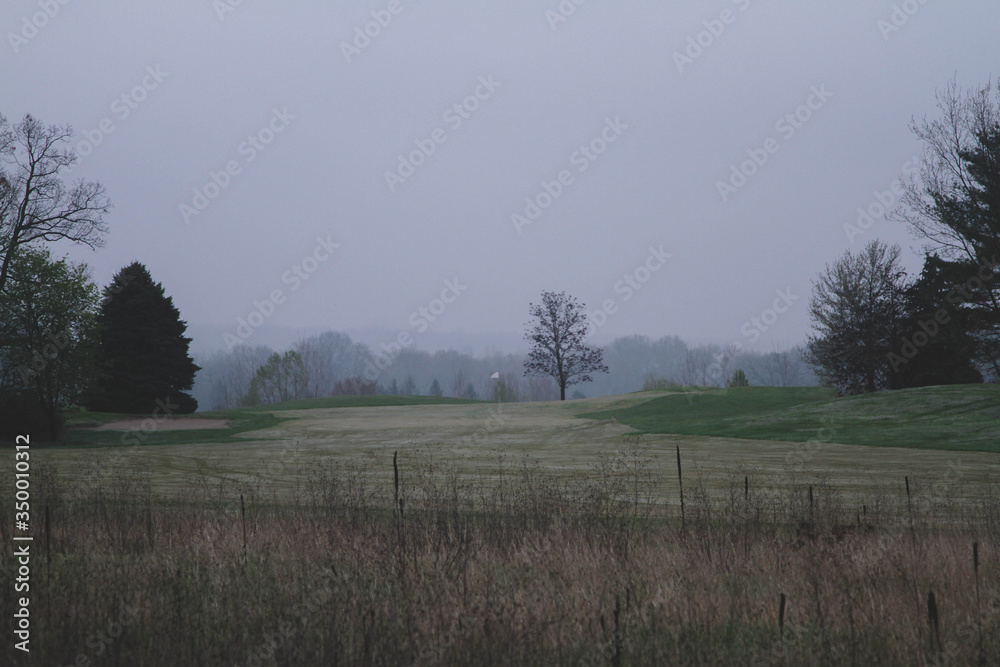 golf course on a foggy day golf course on a foggy day