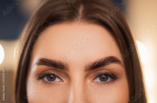 Close-up of laminated and stained eyebrows.