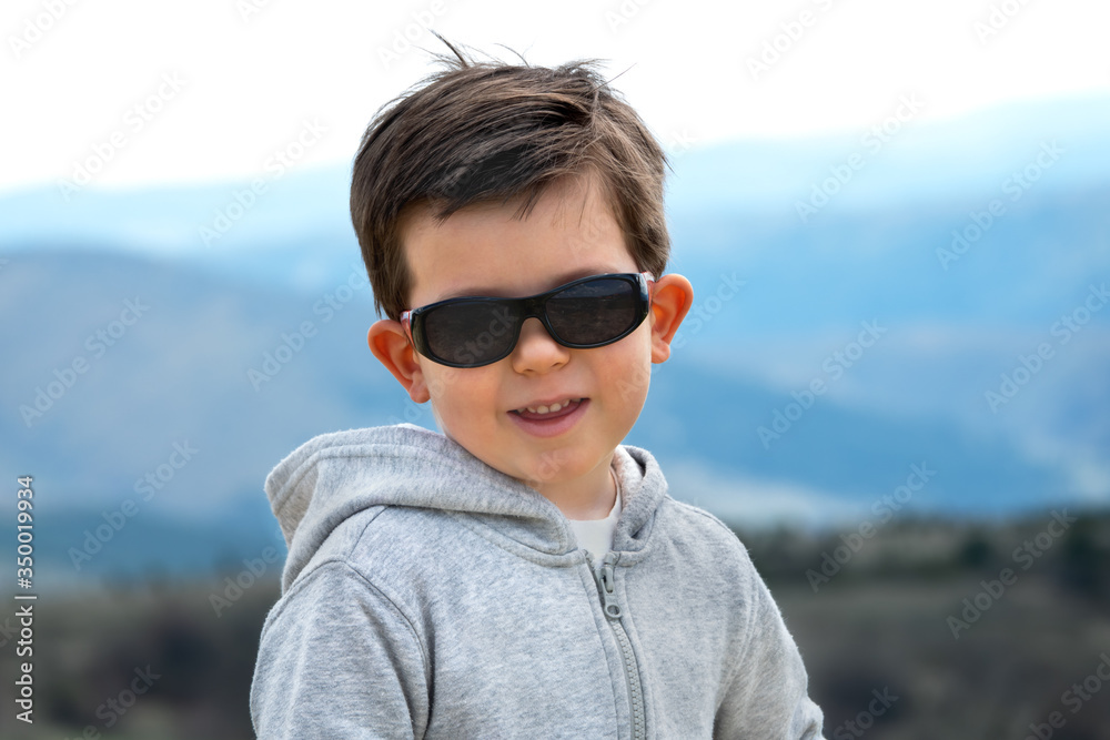 Portrait of a little with sunglasses Portrait of a little with sunglasses