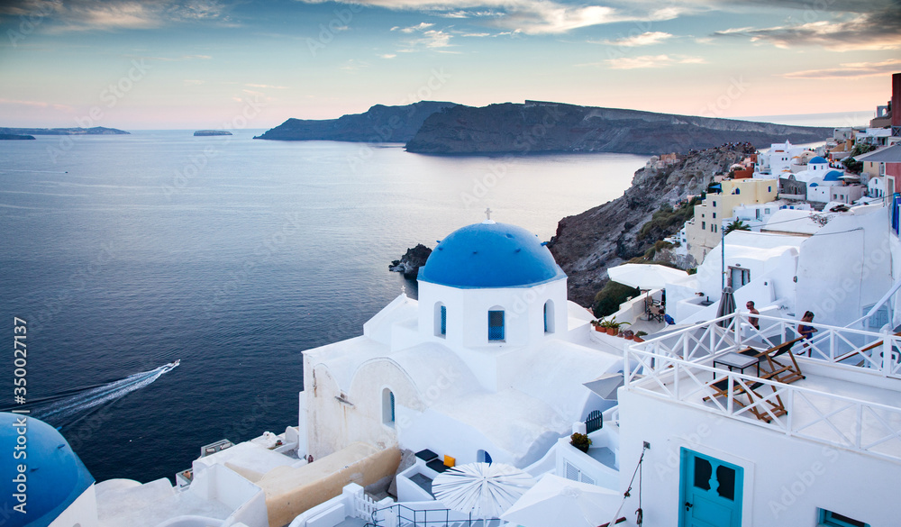 Fototapeta premium traditional white architecture over the Caldera, Aegean sea. Scenic travel background, Santorini