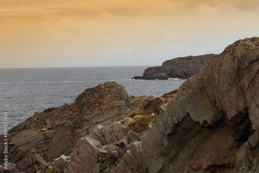Serene morning near the rocks at the beach in Bonavista, Newfoundland, Canada