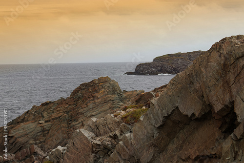 Serene morning near the rocks at the beach in Bonavista, Newfoundland, Canada