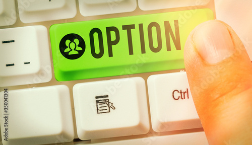 Writing note showing Option. Business concept for the opportunity or ability to choose something or to choose photo