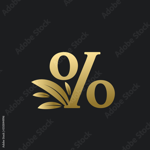 Golden Percentage sign logo with gold leaves. Percentage character % logo with gold leaf.