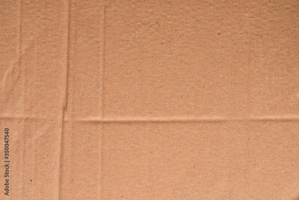 Cardboard paper texture, brown carton material surface Cardboard paper texture, brown carton material surface