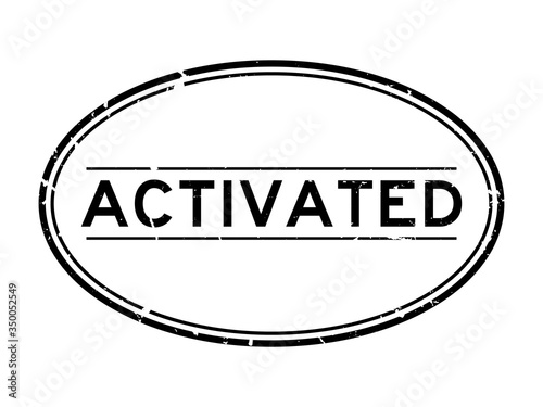 Grunge black activated word oval rubber seal stamp on white background