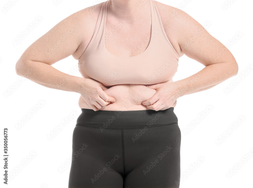 Fototapeta premium Woman with excess weight on white background