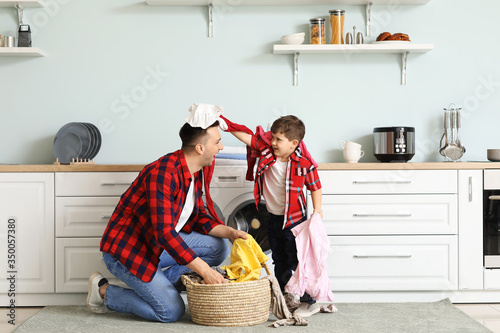 Man and his little son havi...