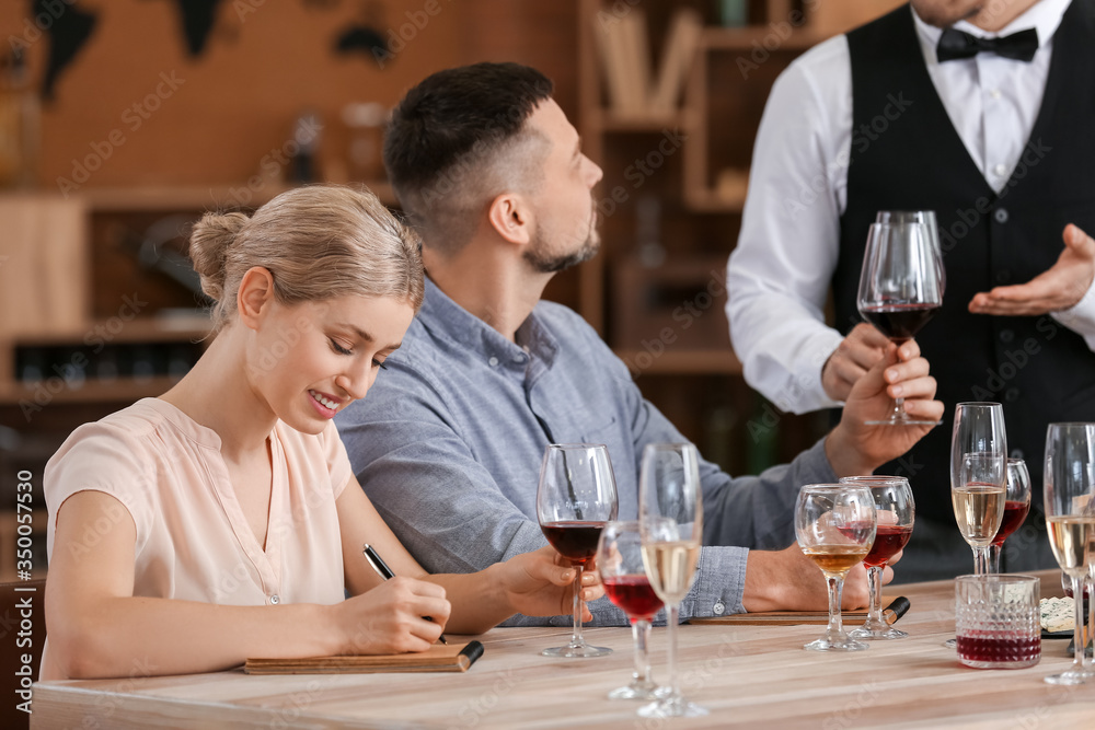 People tasting wine at the restaurant