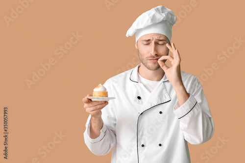 Male confectioner with tast...