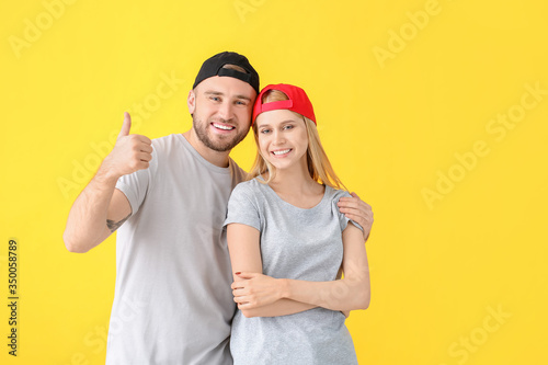 Young couple in stylish cap...
