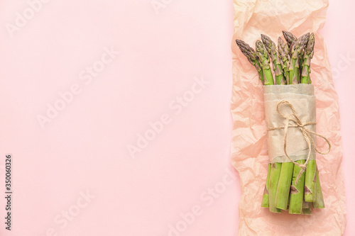 Fresh asparagus on color background