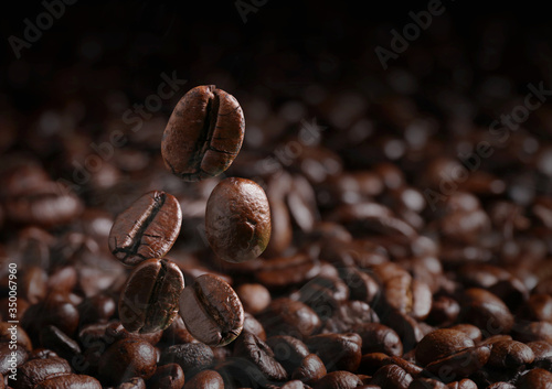Coffee beans that are falling, close up © NAKHARIN
