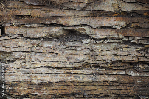 Wall of natural flagstone. Texture. Background for wallpaper.