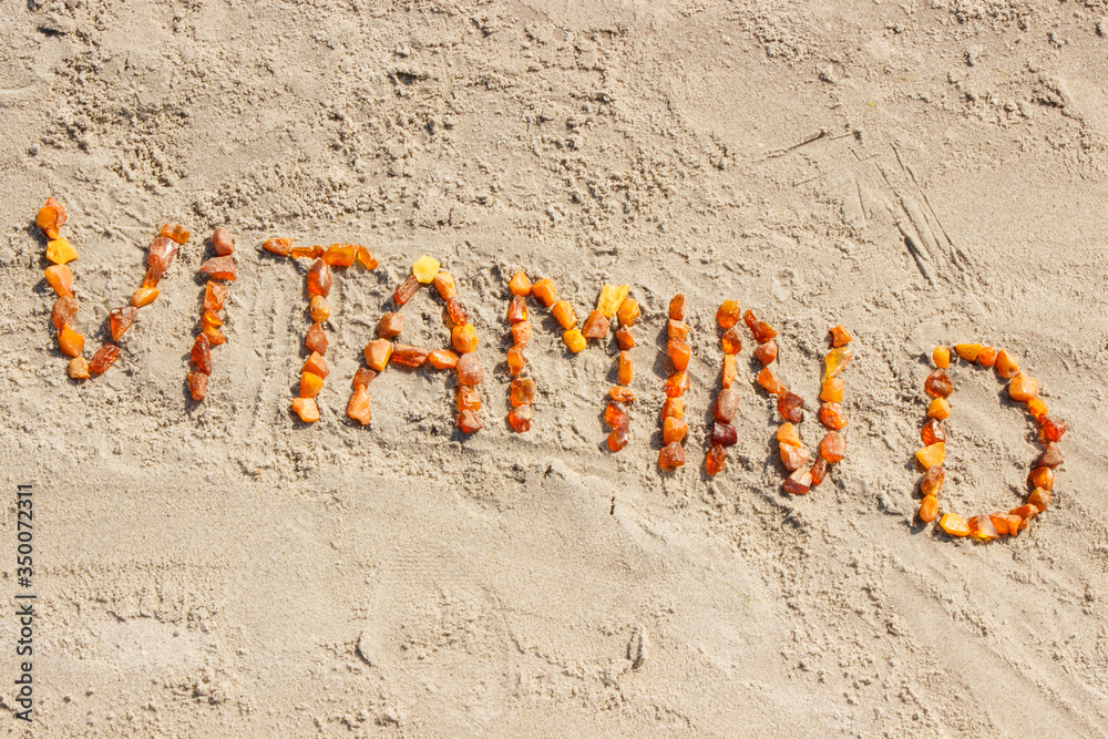 Obraz na płótnie Inscription vitamin D on sand at beach, summer time and healthy lifestyle w salonie