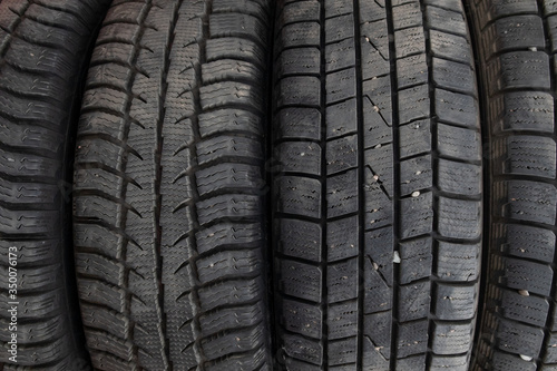 Tire stack background. Winter rubber vehicle tire
