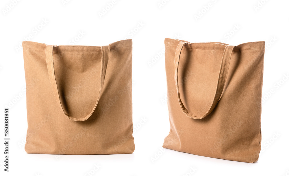 New blank brown cotton bag isolated on white New blank brown cotton bag isolated on white