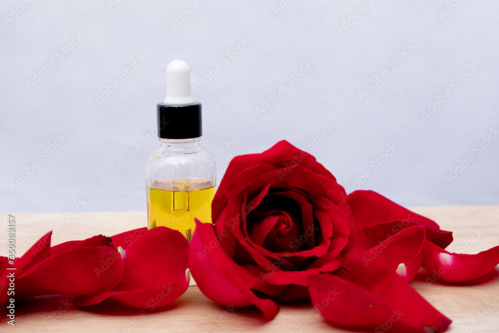 Essential oil in bottles extracted from rose Essential oil in bottles extracted from rose
