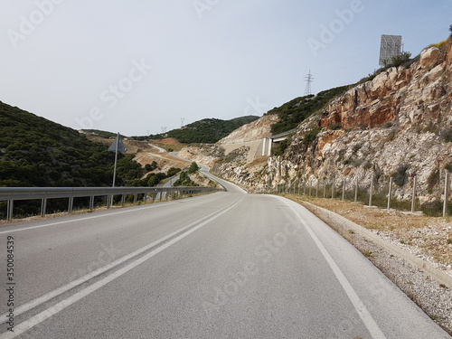 ionia highway street near to the village Anogeio greeece photo